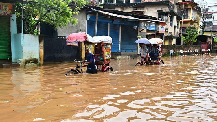 hindistanda sel ve heyelanlar 18 kisinin olumune yol acti TfDQyvpj